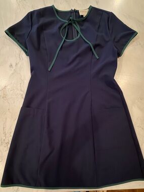 Byrdie Golf Scotti Tie Neck Dress in navy with coordinating green short
